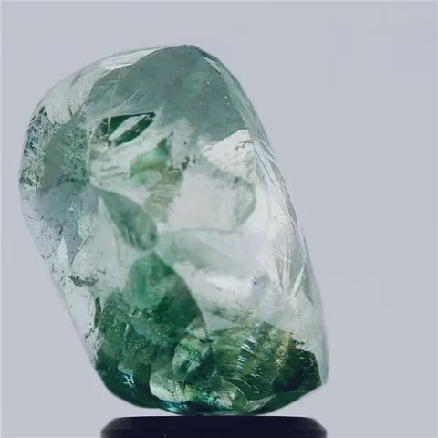 Rare rough greenish-blue diamond representing the raw material that began Alon Ruschin's career
